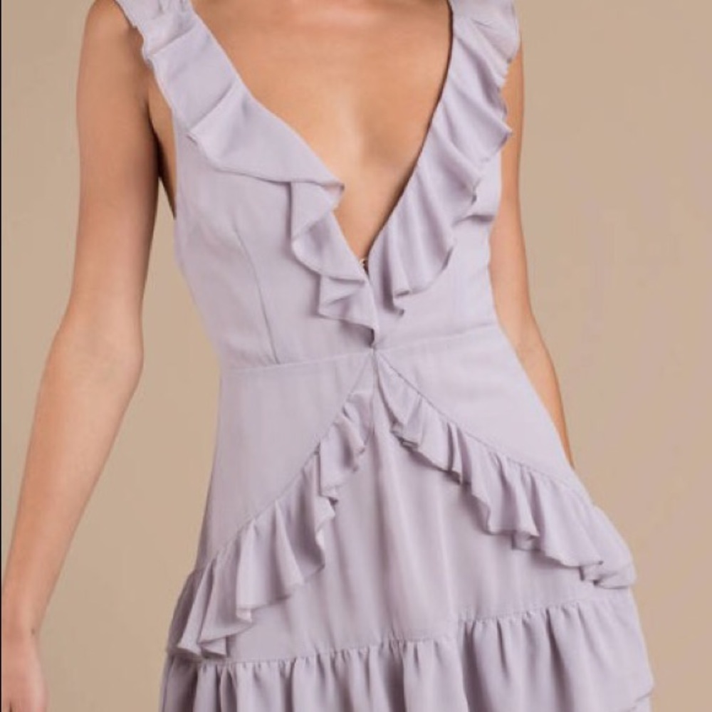 brand new with tags.Tobi dusty purple ruffle dress